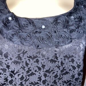 LONDON Style Collection black brocade cocktail dress has rosettes, faux pearls,